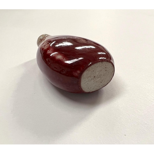 476 - An 19th century Chinese oxblood snuff bottle, height 6cm