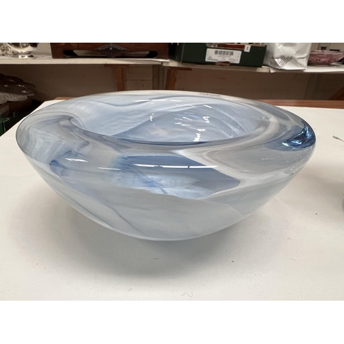 571 - A Kosta Boda heavy studio glass bowl with pale blue and white swirls within blue clear body, width 1... 