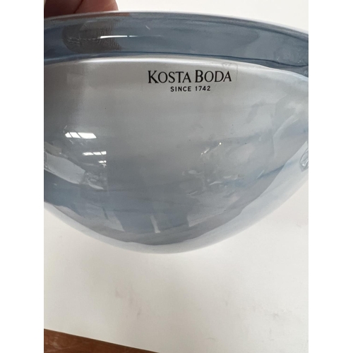 571 - A Kosta Boda heavy studio glass bowl with pale blue and white swirls within blue clear body, width 1... 