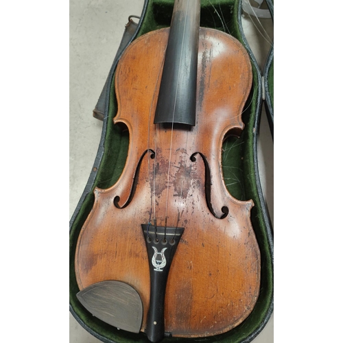 146A - A late 19th/early 20th century violin with single piece back, mother of pearl inlay to saddle with t... 