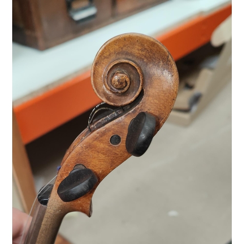 146A - A late 19th/early 20th century violin with single piece back, mother of pearl inlay to saddle with t... 