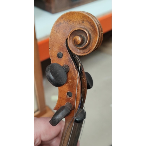 146A - A late 19th/early 20th century violin with single piece back, mother of pearl inlay to saddle with t... 