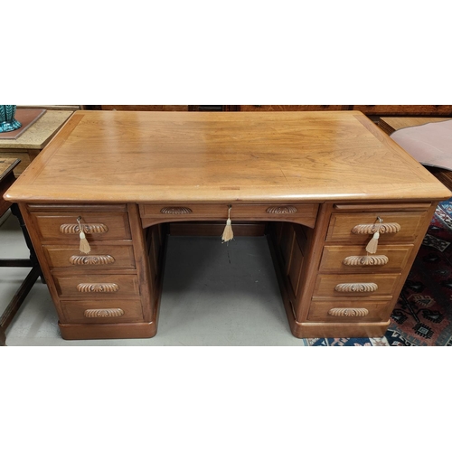 996 - A large walnut pedestal oak desk with 5 drawers to each side with central drawer