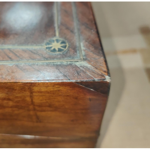 106 - A Victorian lap desk in crossbanded walnut and rosewood, with extensive brass inlay and fitted inter... 