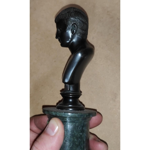 109a - A small classical style bronze, head and shoulder bust of a young man, on marble column