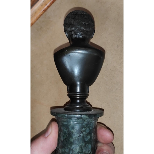 109a - A small classical style bronze, head and shoulder bust of a young man, on marble column