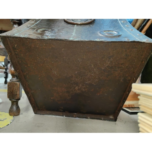 133 - An Arts & Crafts beaten copper coal bin with riveted decoration and jewelled mounts