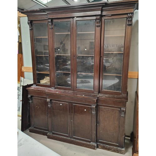 959 - A late Victorian breakfront bookcase with mahogany finish, 185 x 50 x 228cm