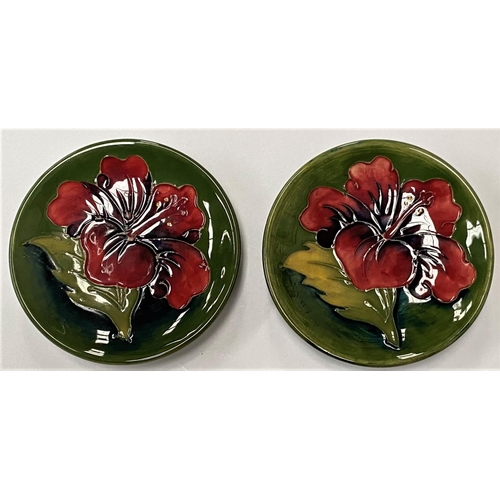 502 - Two Moorcroft green ground Hibiscus pin dishes dia. 11.5cm