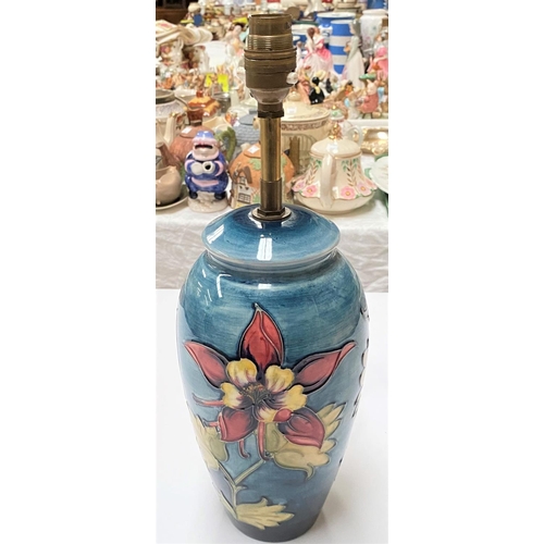 508 - A Moorcroft table lamp, pale blue ground with floral decoration, full height 38cm