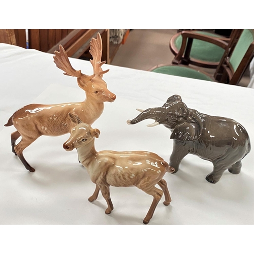 566 - Three Beswick animals:  elephant; fallow deer and stag