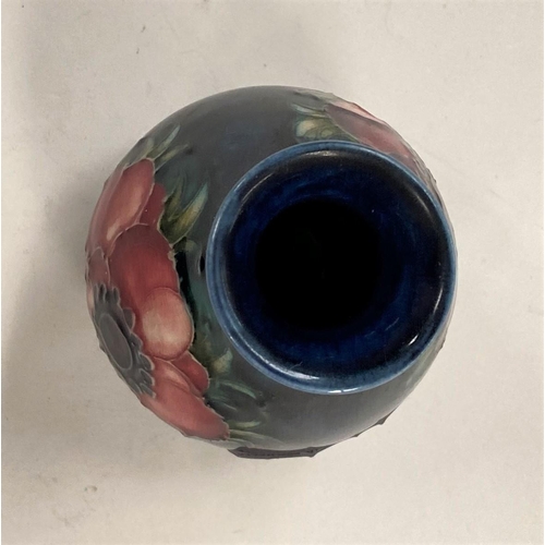 620 - A Moorcroft Anemone Vase with blue ground, height 9cm.