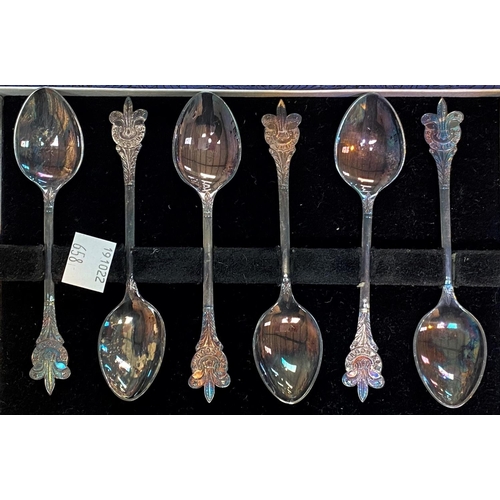 658 - An ornate set of teaspoons and tongs, pastry forks, etc., cased; other cased cutlery