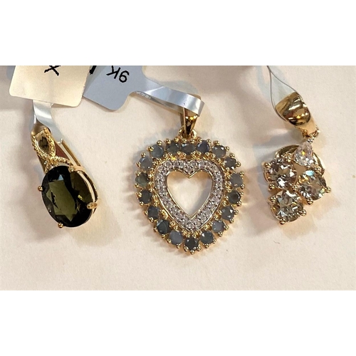 676 - Three '9K' gold pendants:  a heart shape set alexandrite and white zircons; an oval moldavite a... 