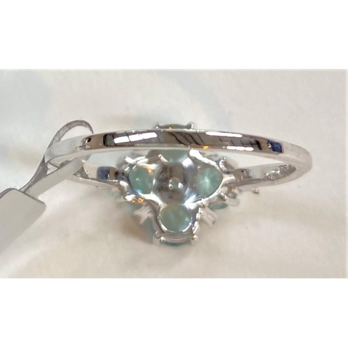 682 - A '9K' white gold dress ring set Aquaiba beryl and white zircon in snowflake design, size N/O; a '9K... 