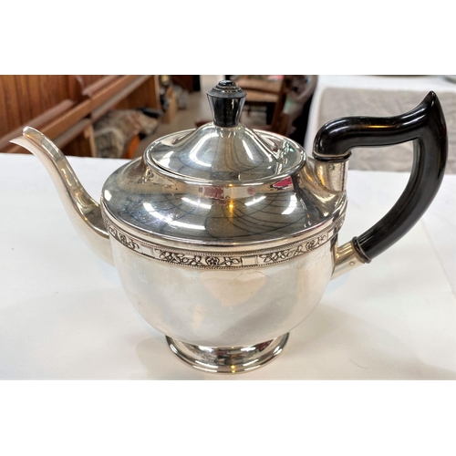 716 - A hallmarked silver sauce boat, Birmingham 1938, 2.5oz; a silver plated 3 piece tea set