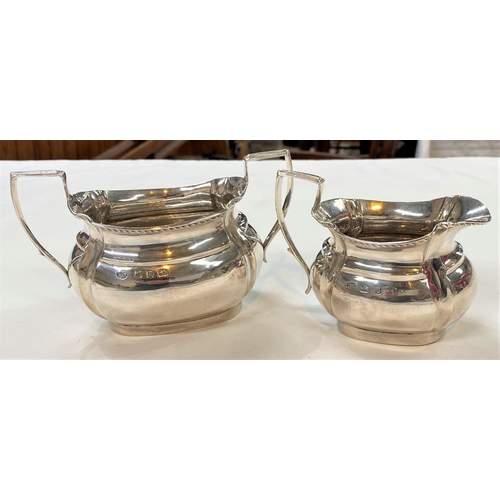 717 - A hallmarked silver sugar bowl and cream jug in the Georgian style, Birmingham 1898, 7.5oz