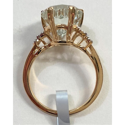 666 - A lady's 9 carat gold dress ring set Wobito snowflake cut prasiolite stone, 4.12 carat, flanked by 4... 