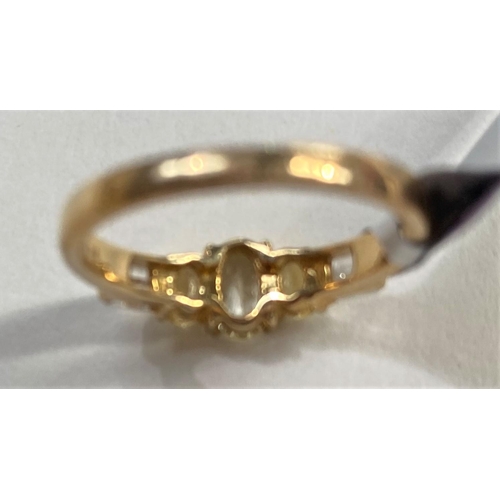 666 - A lady's 9 carat gold dress ring set Wobito snowflake cut prasiolite stone, 4.12 carat, flanked by 4... 