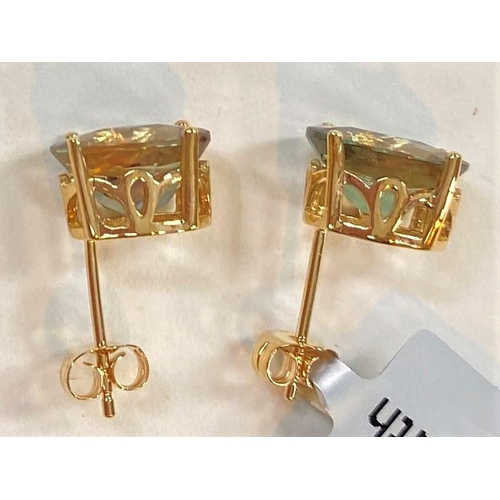 678 - Two pairs of '9K' gold earrings set rectangular green colour change andesines; another '9K' pair set... 