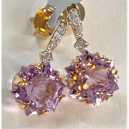 681 - A pair of '9K' gold earrings set Wobito snowflake cut rose de France amethysts and diamonds; a pair ... 