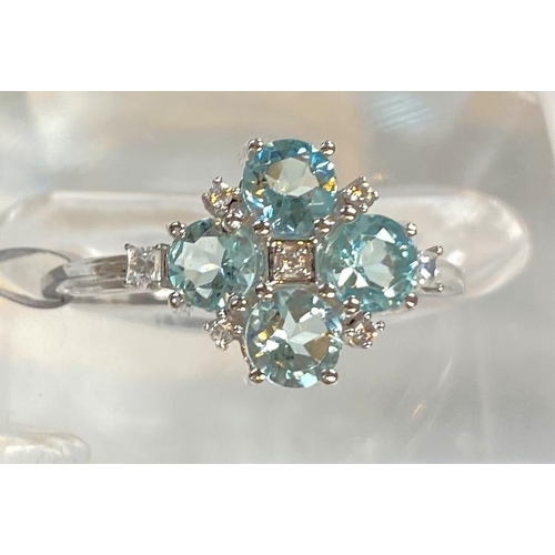 682 - A '9K' white gold dress ring set Aquaiba beryl and white zircon in snowflake design, size N/O; a '9K... 