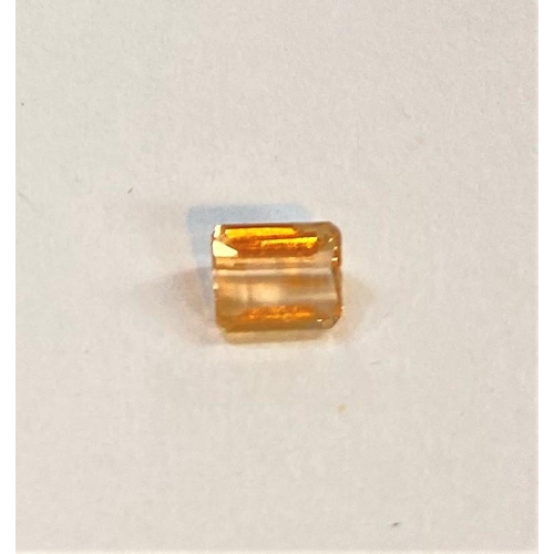 683 - A step cut Imperial Topaz, 0.65 carat, 5.25 x 4.25mm