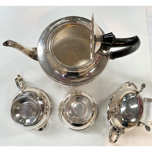 716 - A hallmarked silver sauce boat, Birmingham 1938, 2.5oz; a silver plated 3 piece tea set