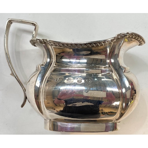 717 - A hallmarked silver sugar bowl and cream jug in the Georgian style, Birmingham 1898, 7.5oz