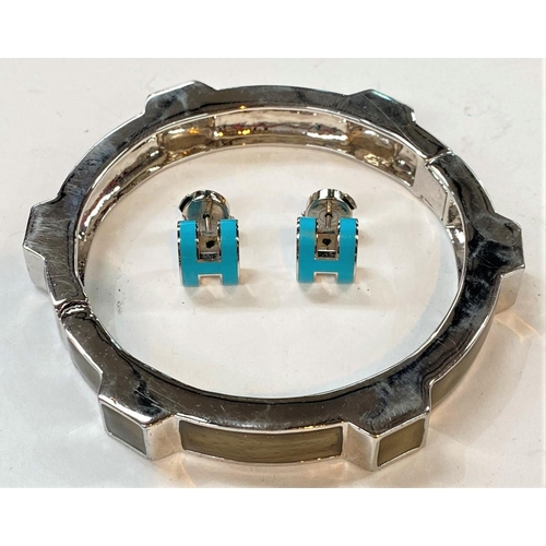 741 - A Hermes hinged bangle and a pair of turquoise enamel earrings in original box