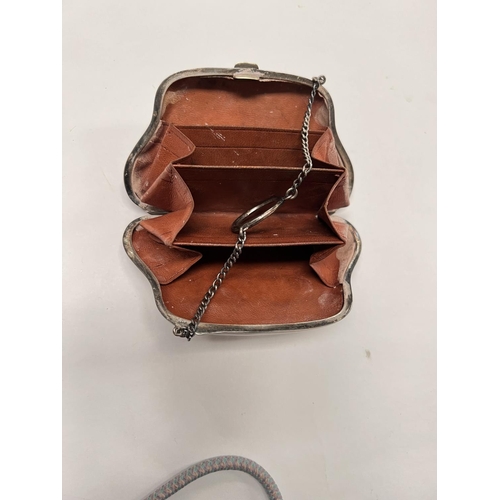 706 - A hallmarked silver purse on the form of a  hand bag;  three hallmarked silver napkin ring... 