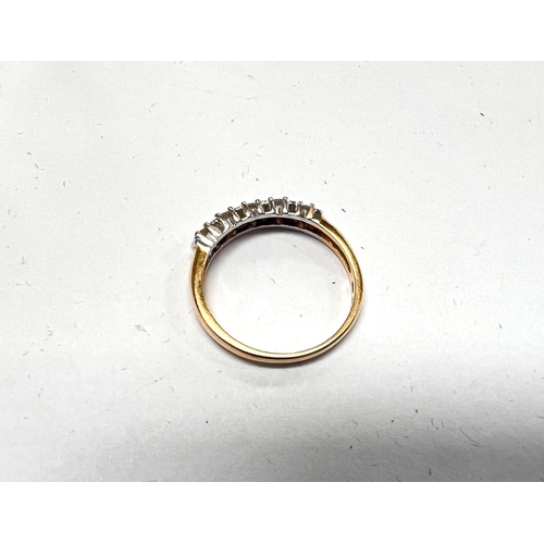 710 - An 18 carat hallmarked gold ring set with 5 diamonds, approximately 3mm, 3 gm gross, size Q