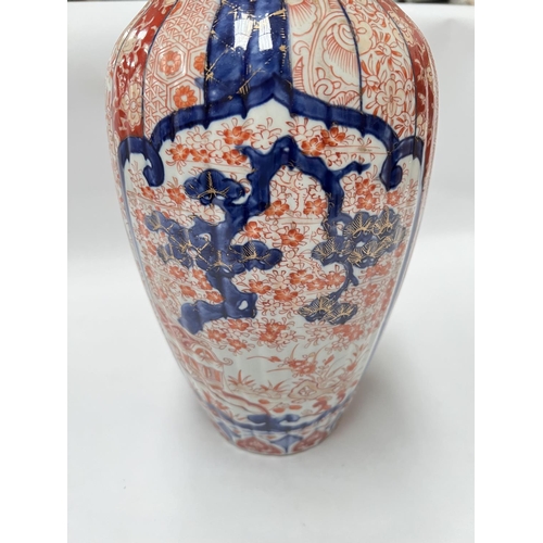 440 - A 19th century Japanese Imari pattern ribbed vase, heigt 24cm