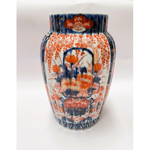 441 - A 19th century Japanese Imari pattern ribbed vase, height 24cm