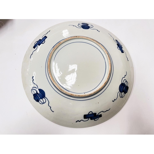 444 - A large Japanese Imari pattern charger with floral decoration etc, diameter 40cm