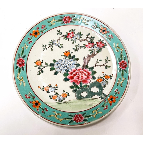 482 - A Chinese polychrome dish with turquoise border, central flowers with red mark and incised mark to b... 