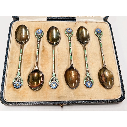 640 - A set of 6 cased hallmarked silver enamelled teaspoons with flower terminals and green stems, Birmin... 