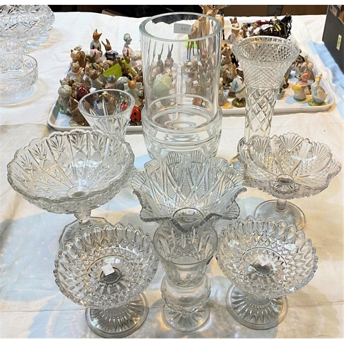 580 - A selection of cut and other glassware, including decanters, vases, drinking glasses etc.