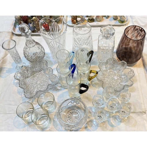 580 - A selection of cut and other glassware, including decanters, vases, drinking glasses etc.