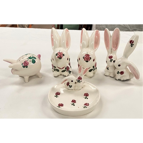 606c - Five Wemyss small Plichta animals:  3 rabbits; rabbit dish & pig