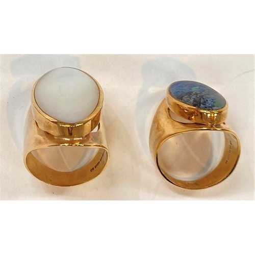 634 - A lady's 9 carat hallmarked gold dress ring with broad shank set oval mother-of-pearl; a 9 carat hal... 