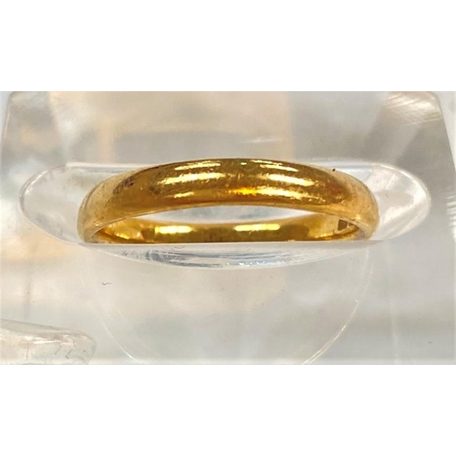 656 - A 22 carat hallmarked gold wedding ring, 3gm