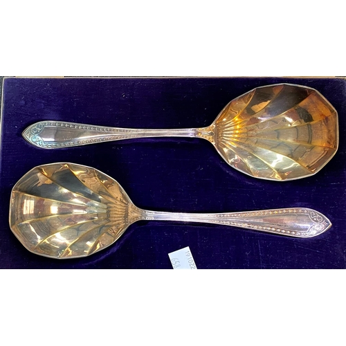 658 - An ornate set of teaspoons and tongs, pastry forks, etc., cased; other cased cutlery