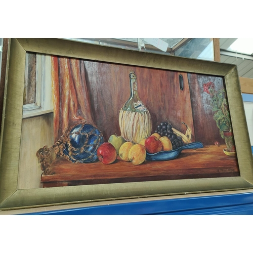 130A - A mid 20th century oil on canvas still life of fruit 39 x 75cm gilt framed, signed indistinctly