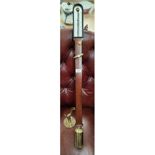 135 - A Georgian style mahogany cased marine barometer with brass cistern, brass gimbal support, 92cm