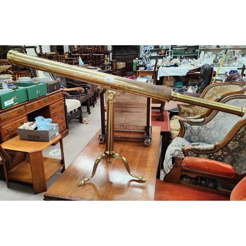 144 - A 19th century brass telescope signed HAWES, LONDON, on tapering brass column with folding tripod ba... 