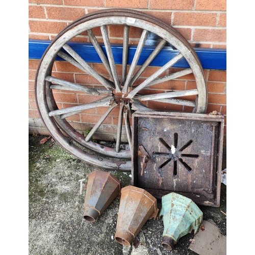 188 - Two large wooden wagon style wheels (a.f) cast metal drainpipe funnels and other metal ware etc