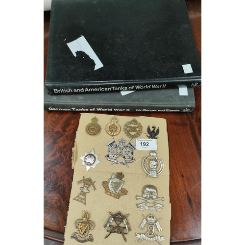 192 - A selection of Cavalry badges and two books on military tanks etc