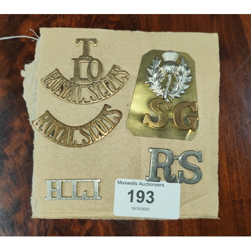 193 - Five rare Royal Scots and other military shoulder titles