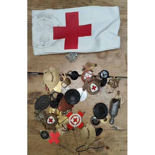 198 - A Red Cross air raid warden's badge, arm band and other similar badges